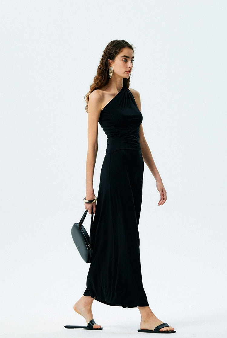 Side view of black one-shoulder ruched maxi dress