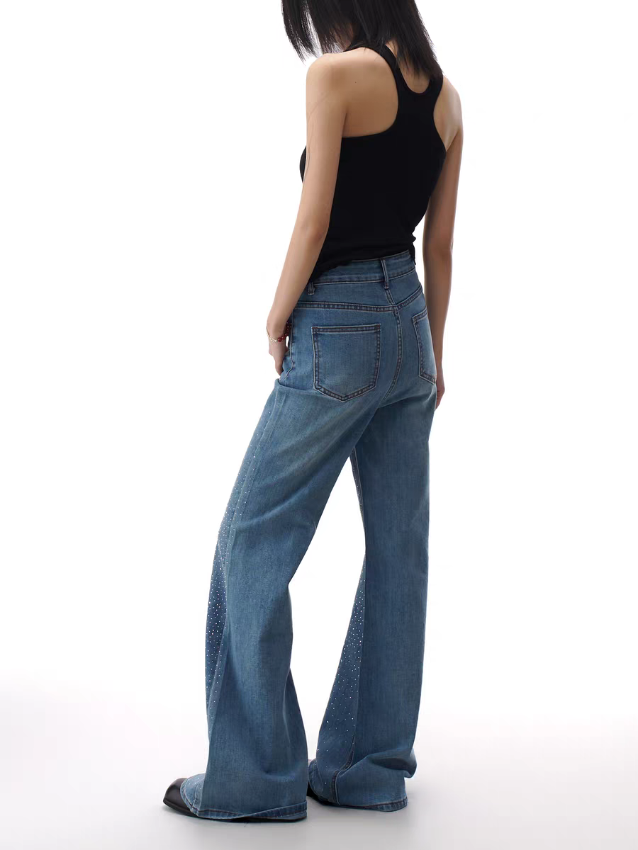 Rhinestone flare jeans back view showing pockets