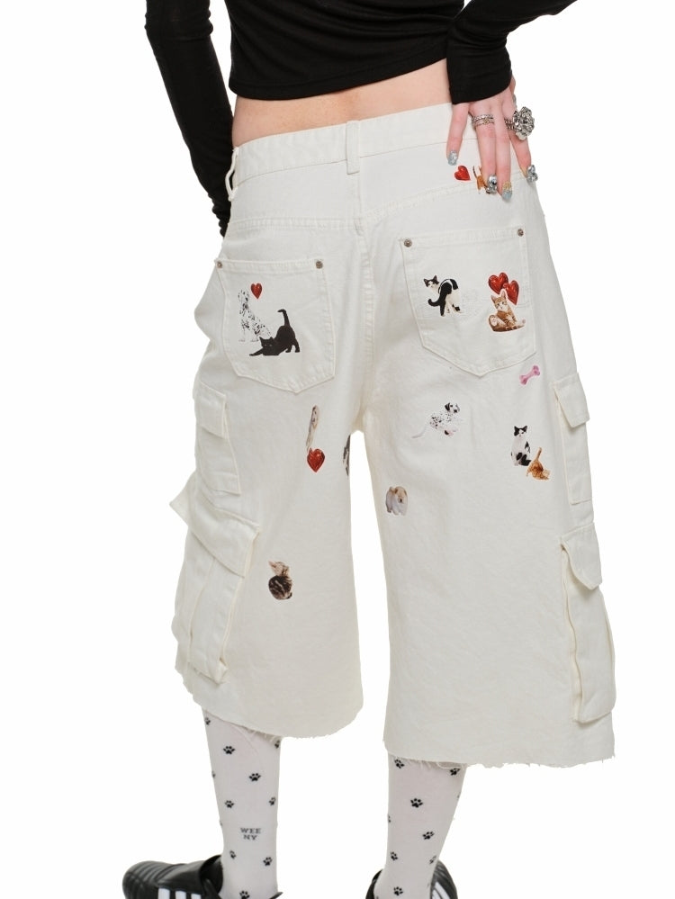 Pantalones cortos cargo de mezclilla desgastados con salpicaduras de pintura