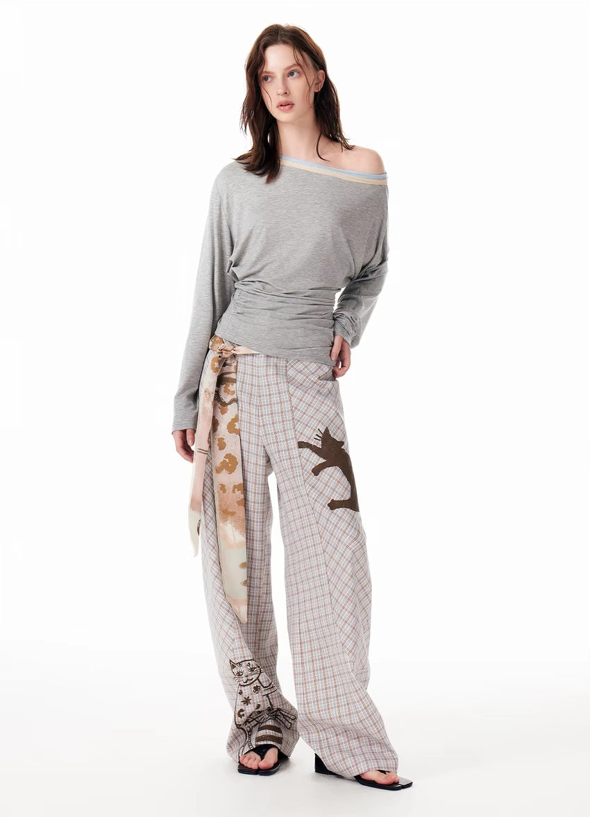 Y2K-Hose mit weitem Bein und Katzen-Skizze