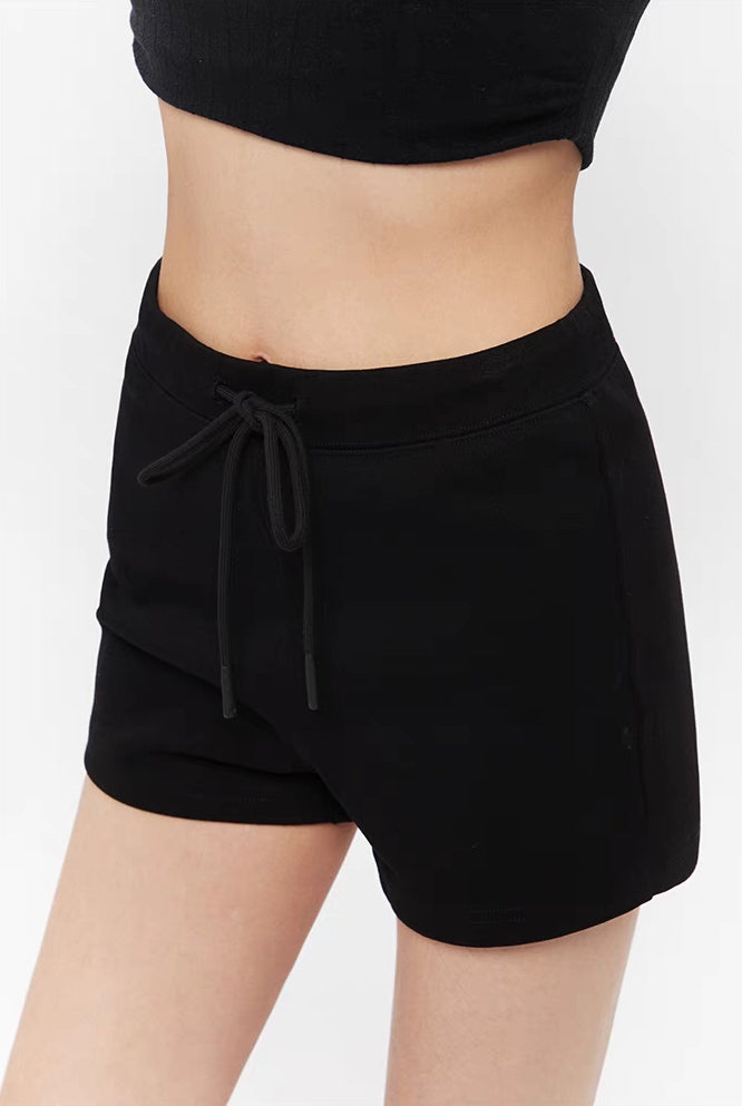 Pantalones cortos minimalistas con cordón