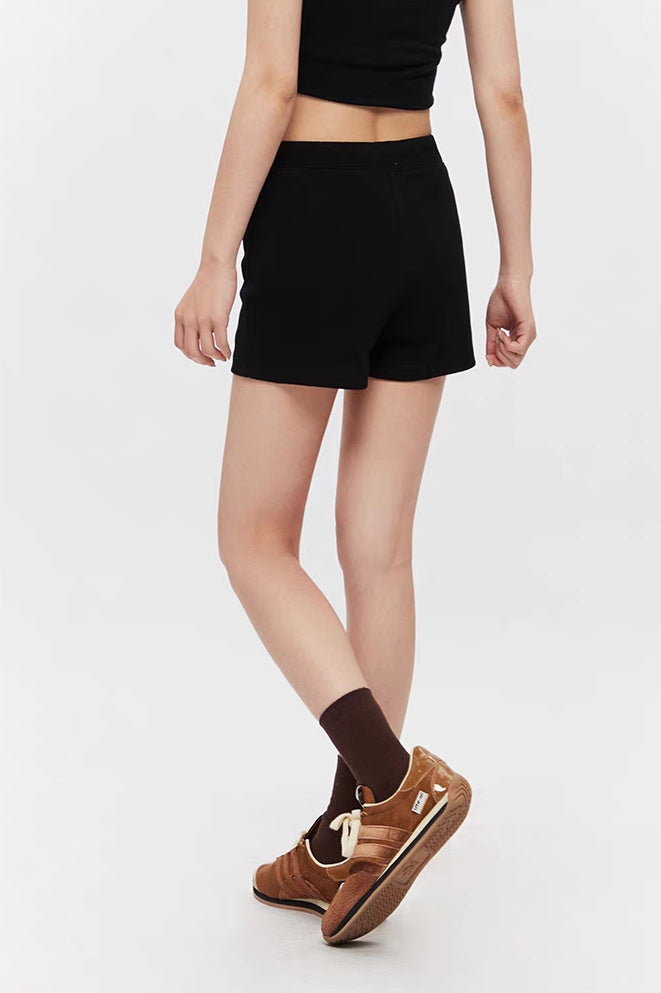 Pantalones cortos minimalistas con cordón
