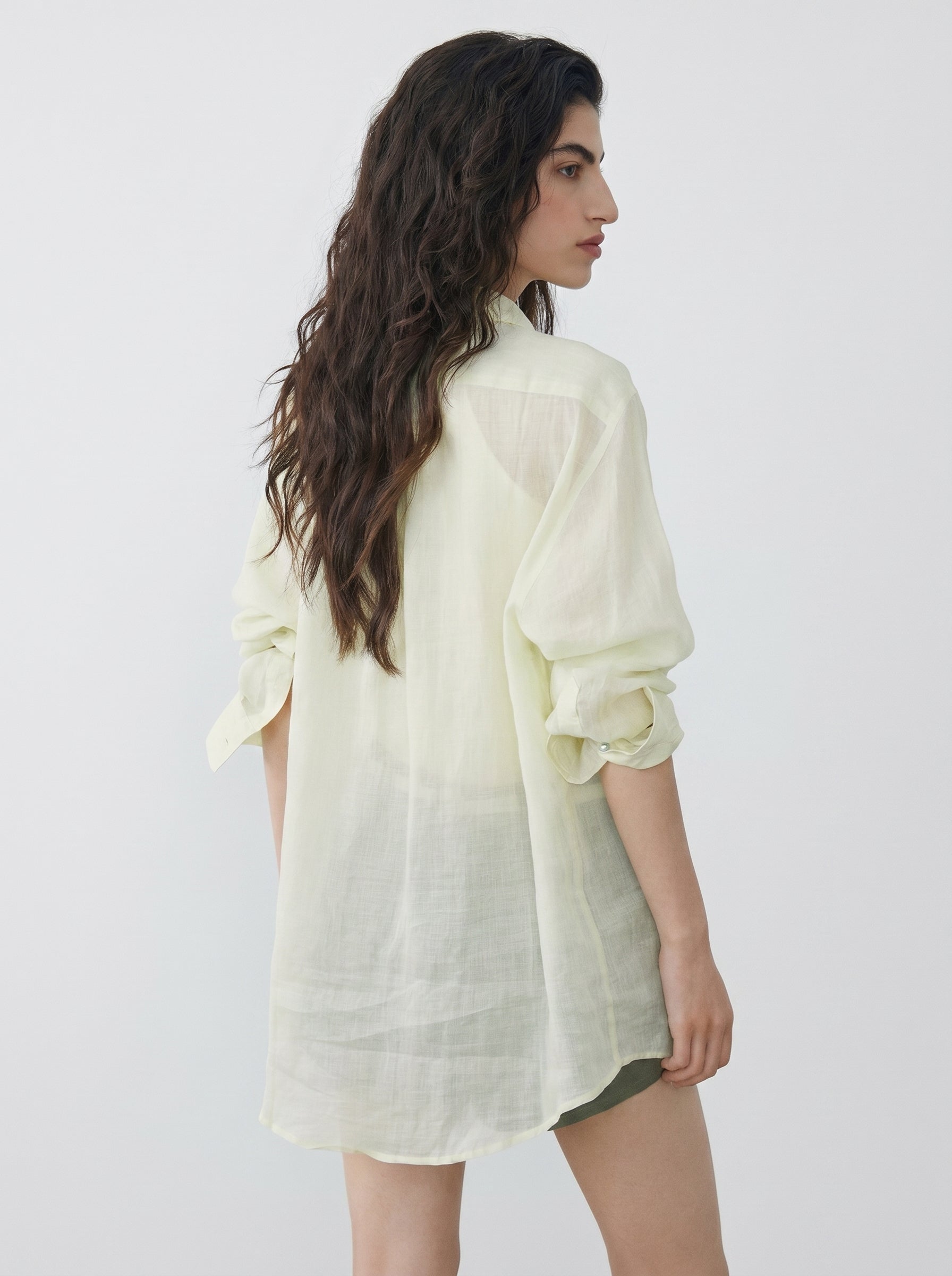 BapHood apple green relaxed ramie shirt shown from the side with a soft sheer layered finish.