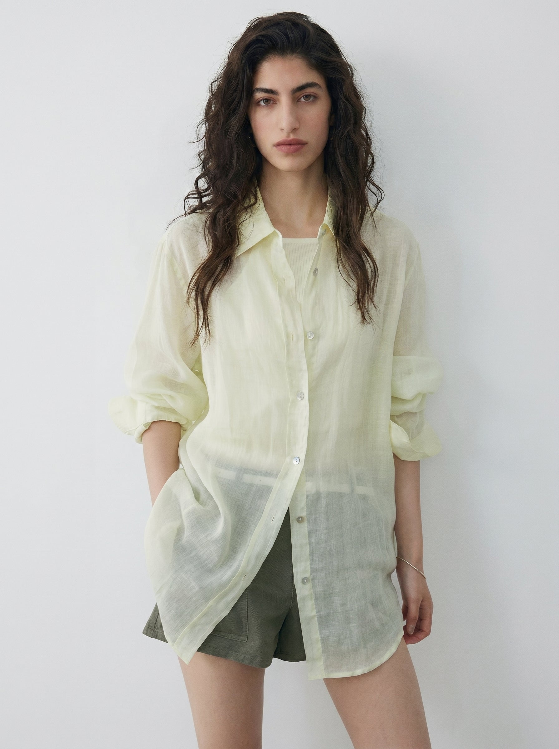 BapHood apple green sheer long sleeve shirt styled open over shorts with a relaxed summer fit.