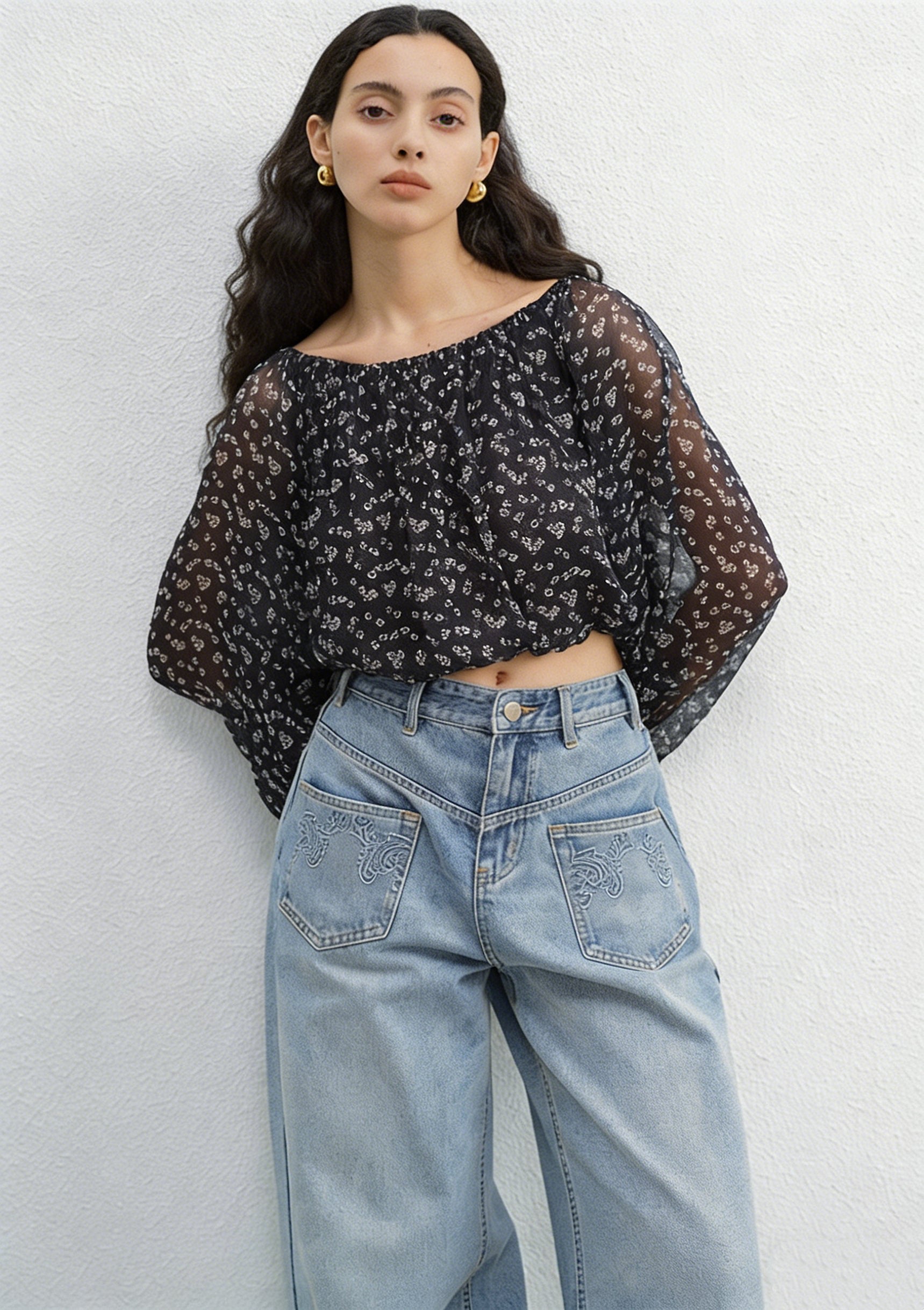 BapHood black floral off-shoulder blouse and tiered midi skirt two-piece set with soft flowing movement