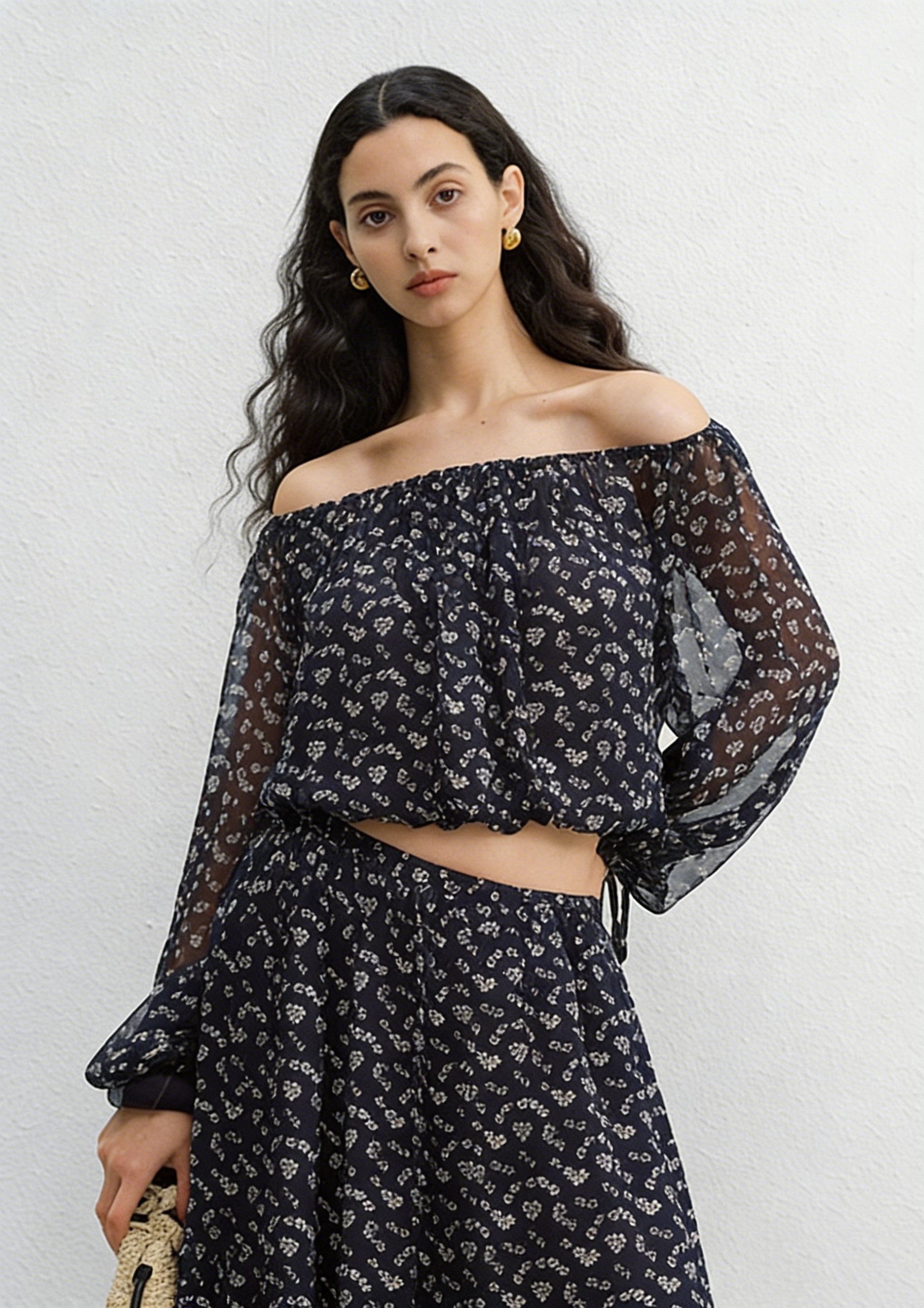 BapHood black floral off-shoulder blouse and flowing midi skirt two-piece outfit with romantic silhouette