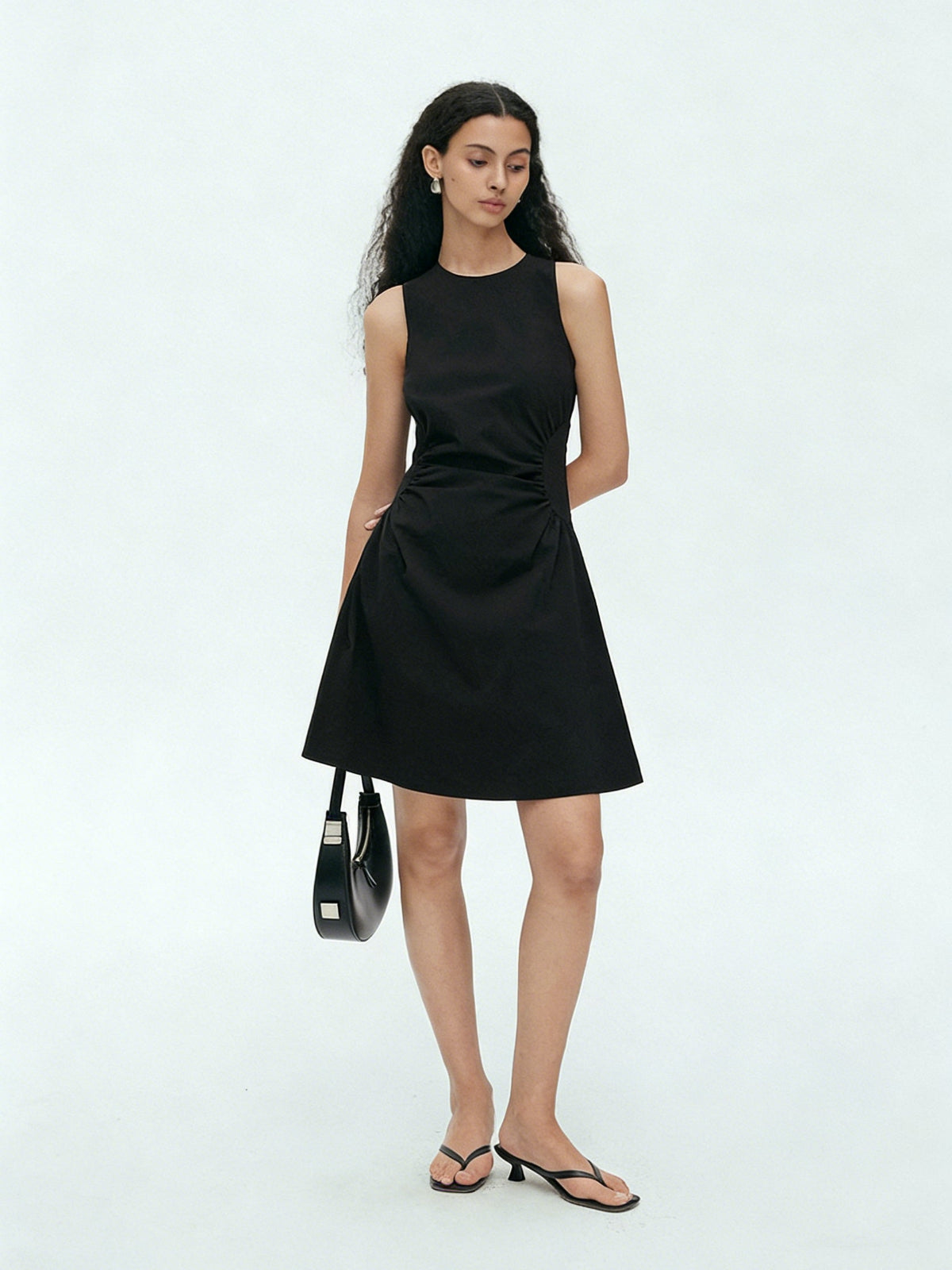 BapHood black sleeveless ruched waist mini dress with flattering sculpted silhouette