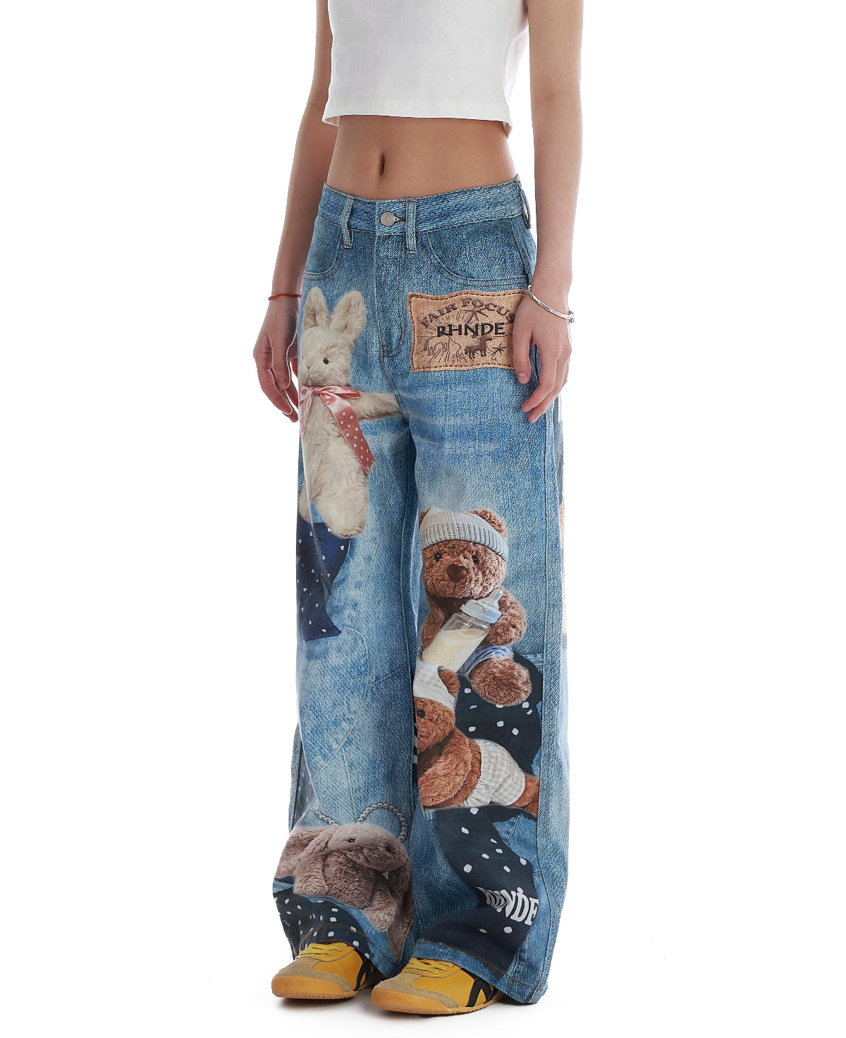BapHood blue printed wide-leg jeans shown full length with teddy graphics and floor-skimming drape.