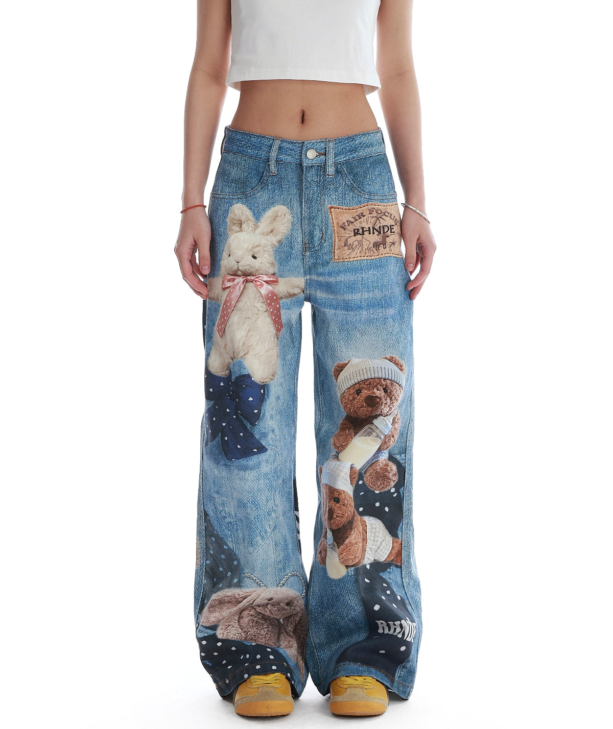 BapHood blue teddy graphic jeans with a high waist, wide-leg shape, and statement printed panels.