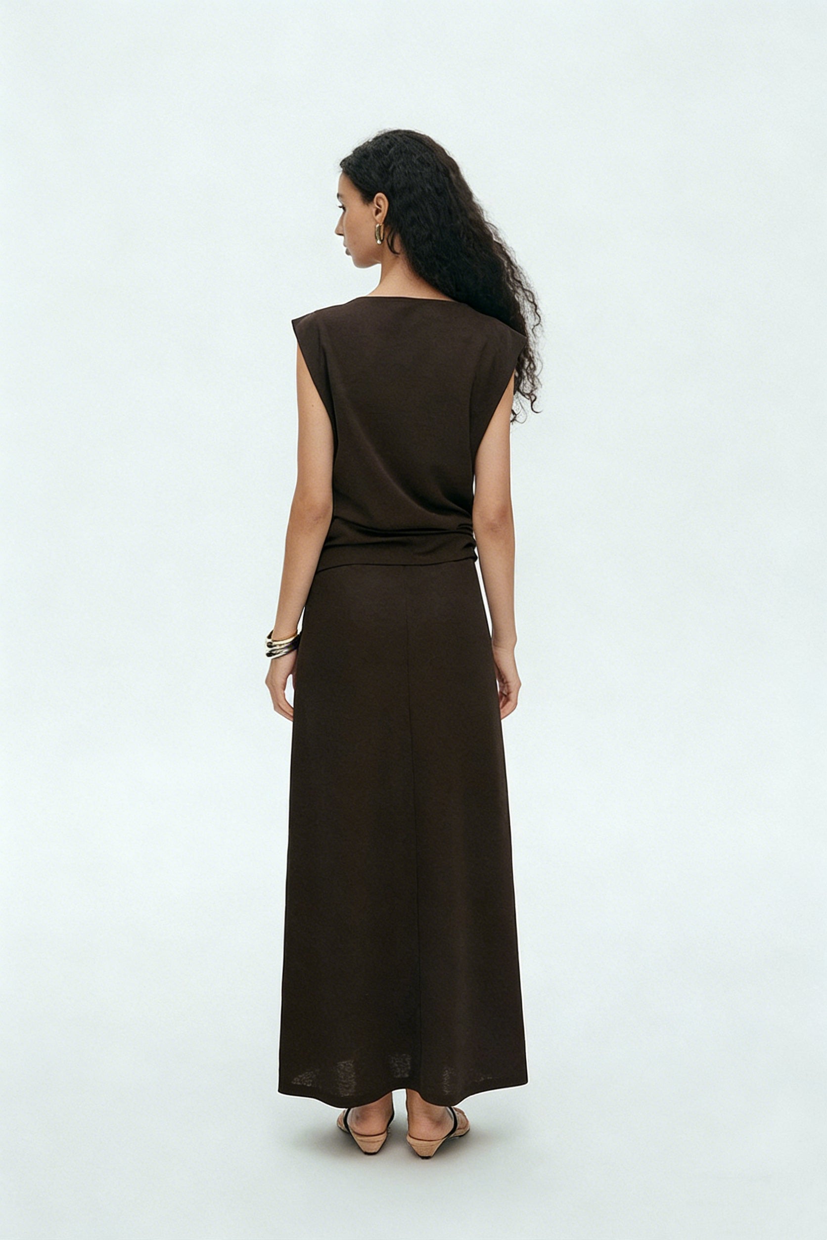 BapHood brown sleeveless draped top and long maxi skirt set shown from back with clean minimalist silhouette