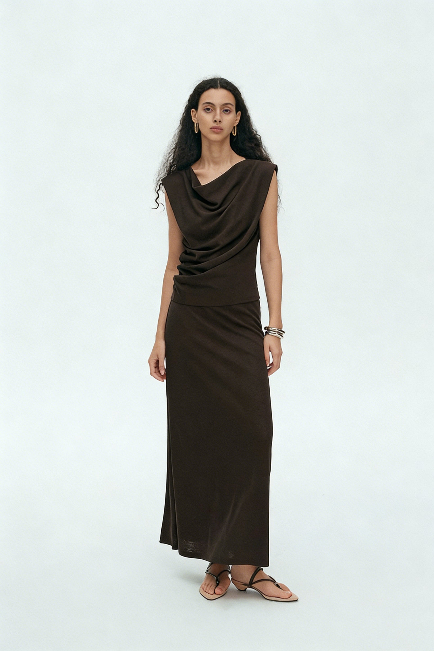 BapHood brown sleeveless draped top and long maxi skirt two-piece set with elegant minimalist silhouette