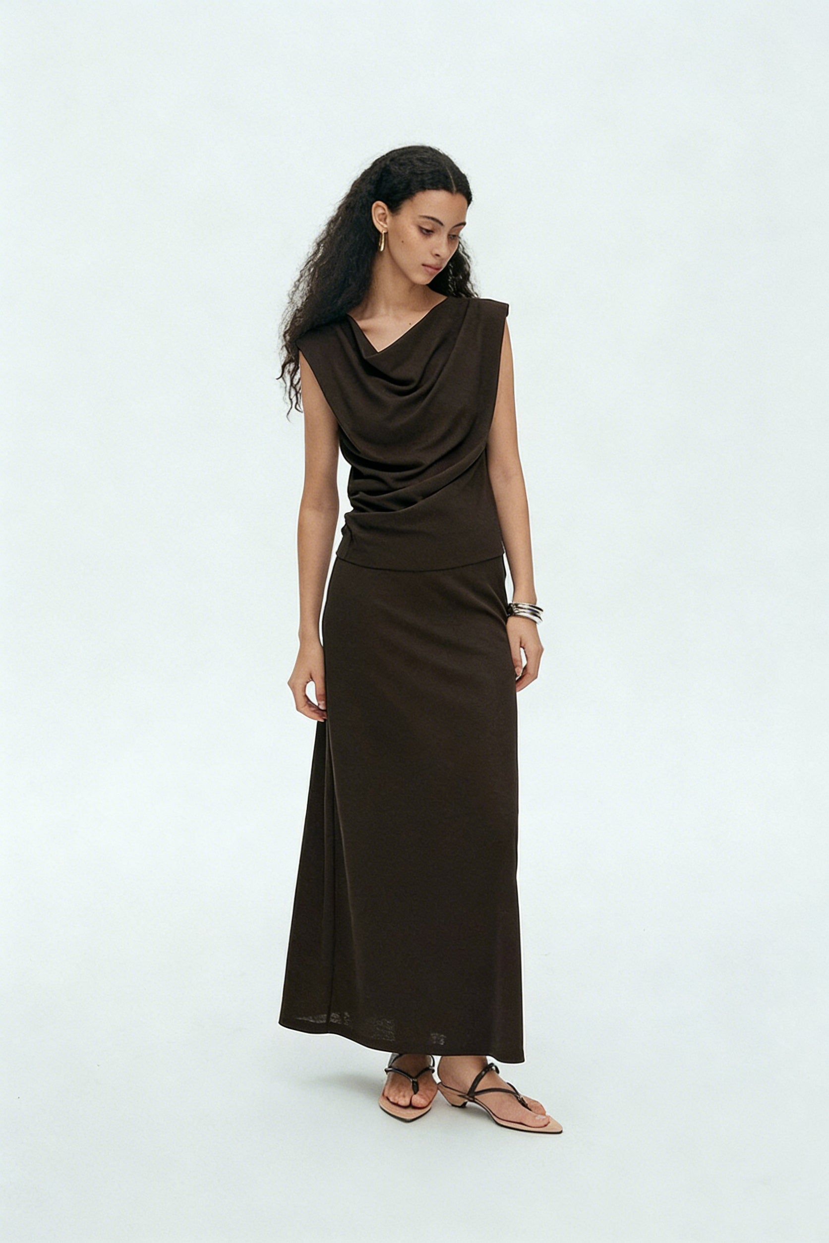 BapHood brown sleeveless draped top and long maxi skirt two-piece set with elegant minimalist silhouette