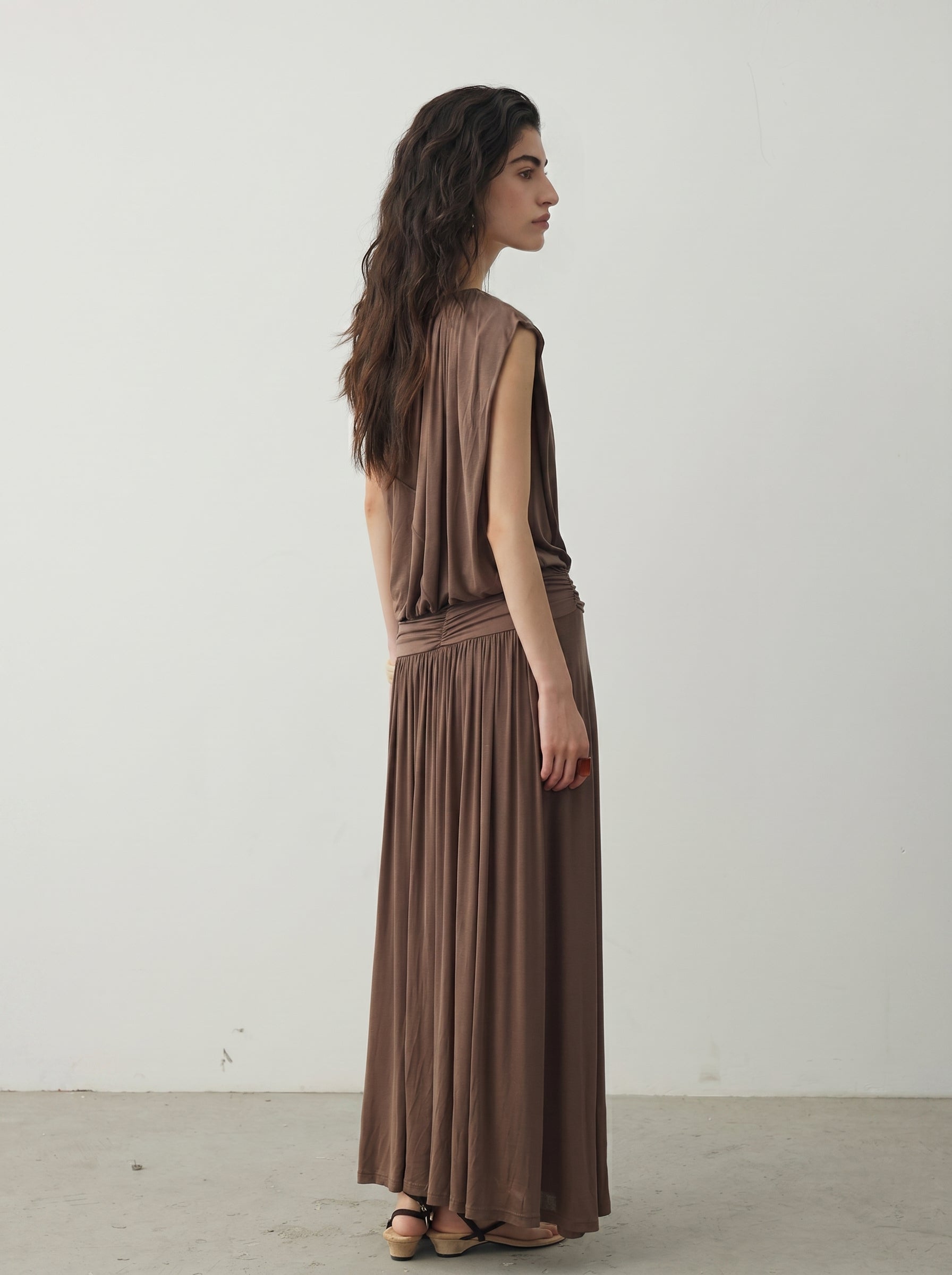 BapHood brown ruched two-piece skirt set with a sleeveless top, high waist, and front slit maxi skirt.