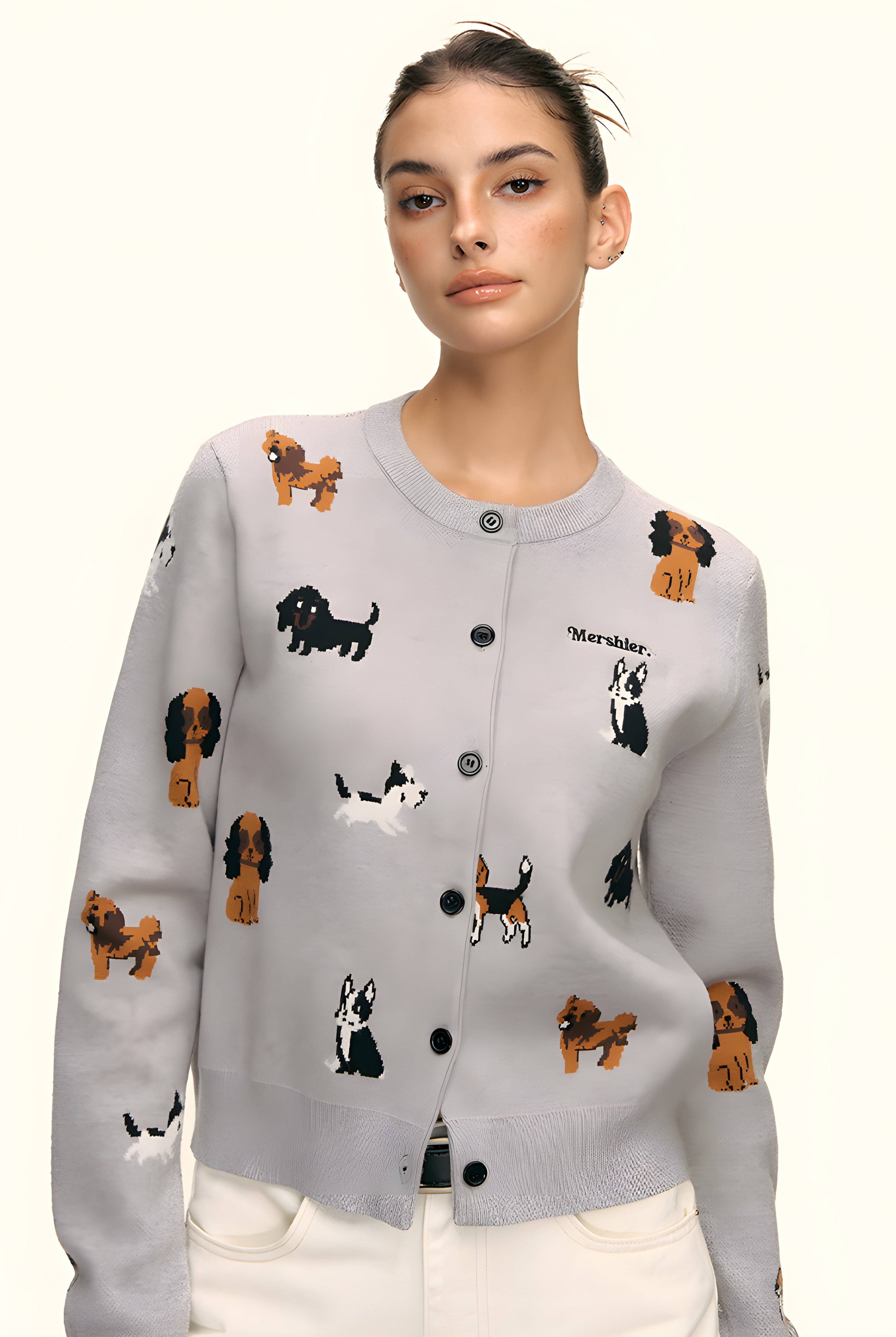 Detail shot of front of puppy print grey knit cardigan