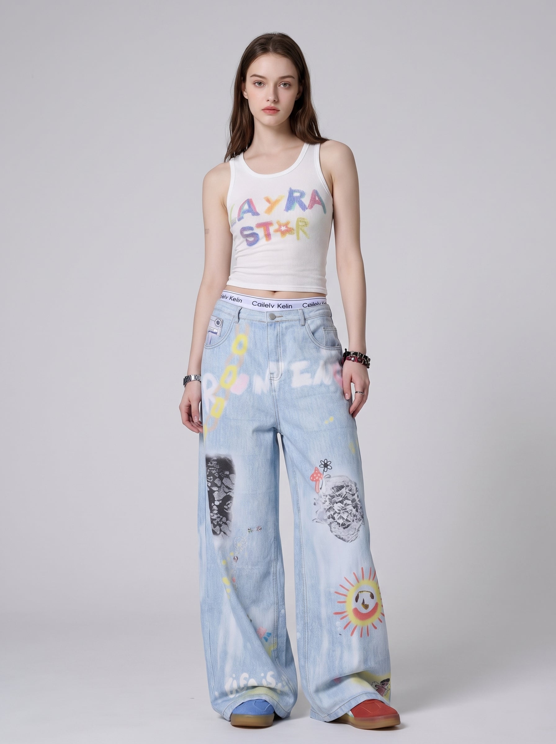 Full-body view of playful graffiti dreamscape wide-leg jeans