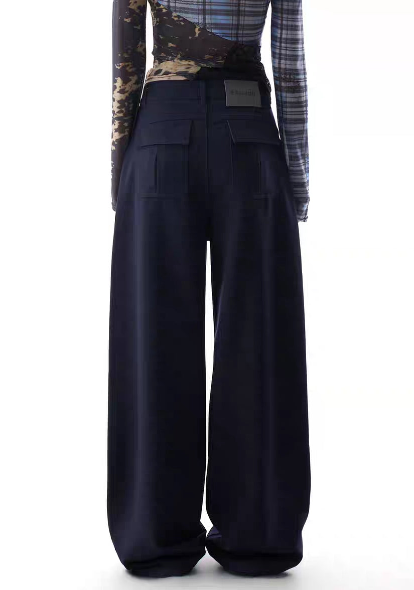 Back view of navy wide-leg trousers with utility pocket detail