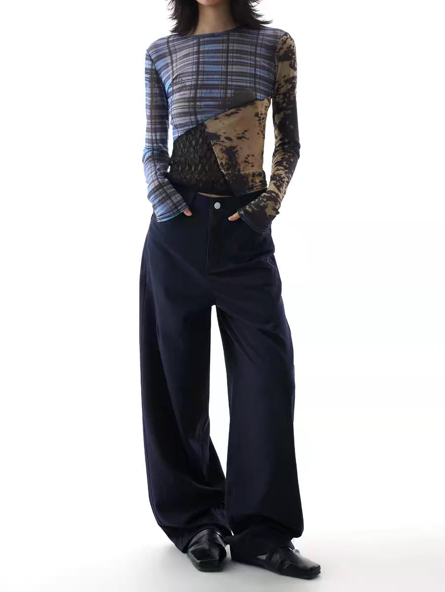 Model wearing navy high-waist wide-leg utility trousers, front view

