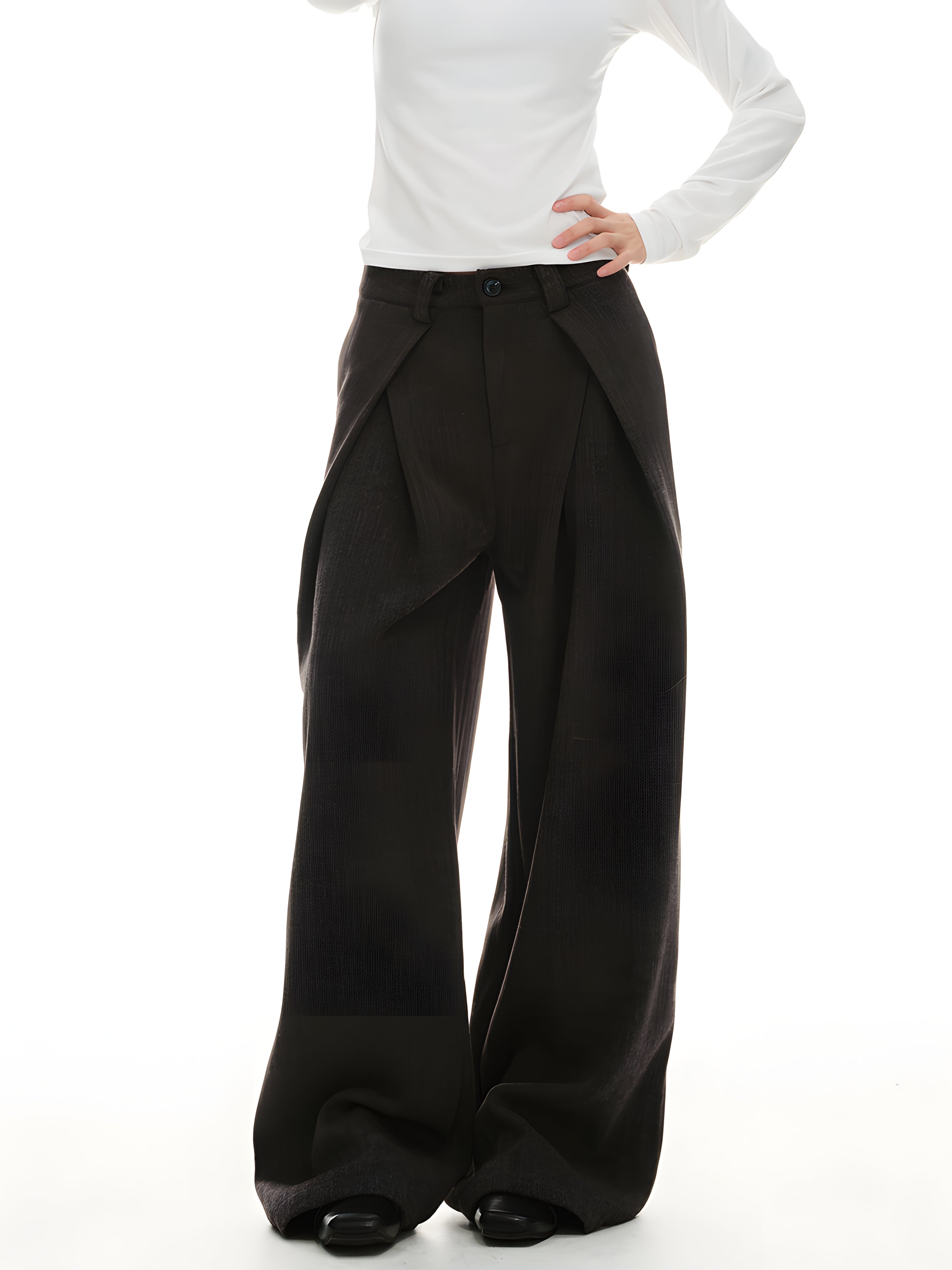 Front view of dark mocha draped wide-leg trousers with opened overlay panel detail