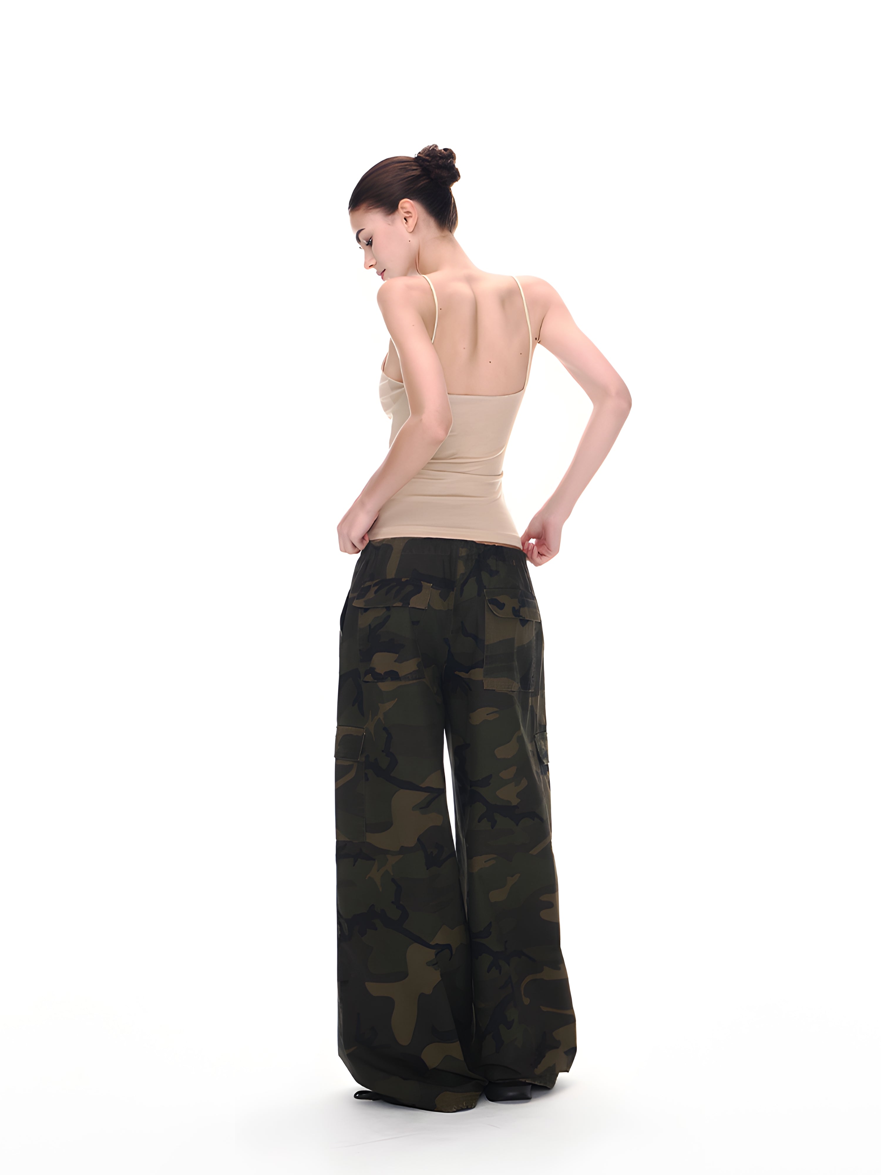 Back view of army green camo wide-leg cargo pants with patch pockets