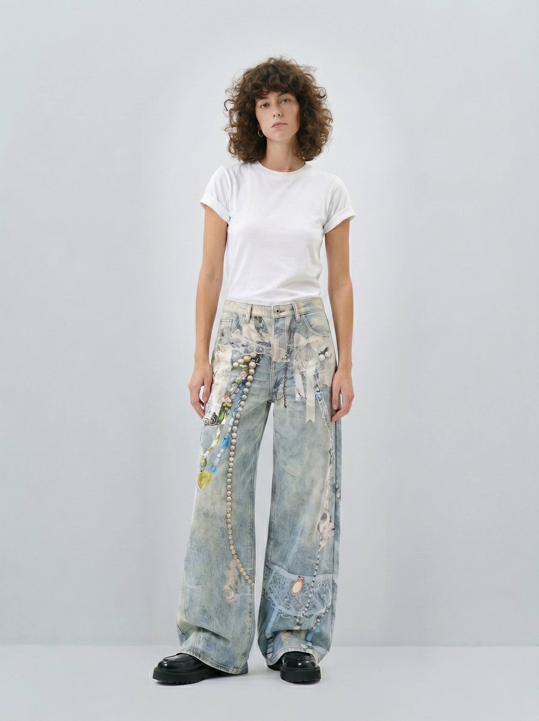 Pearl chain trompe l'oeil wide-leg jeans on model