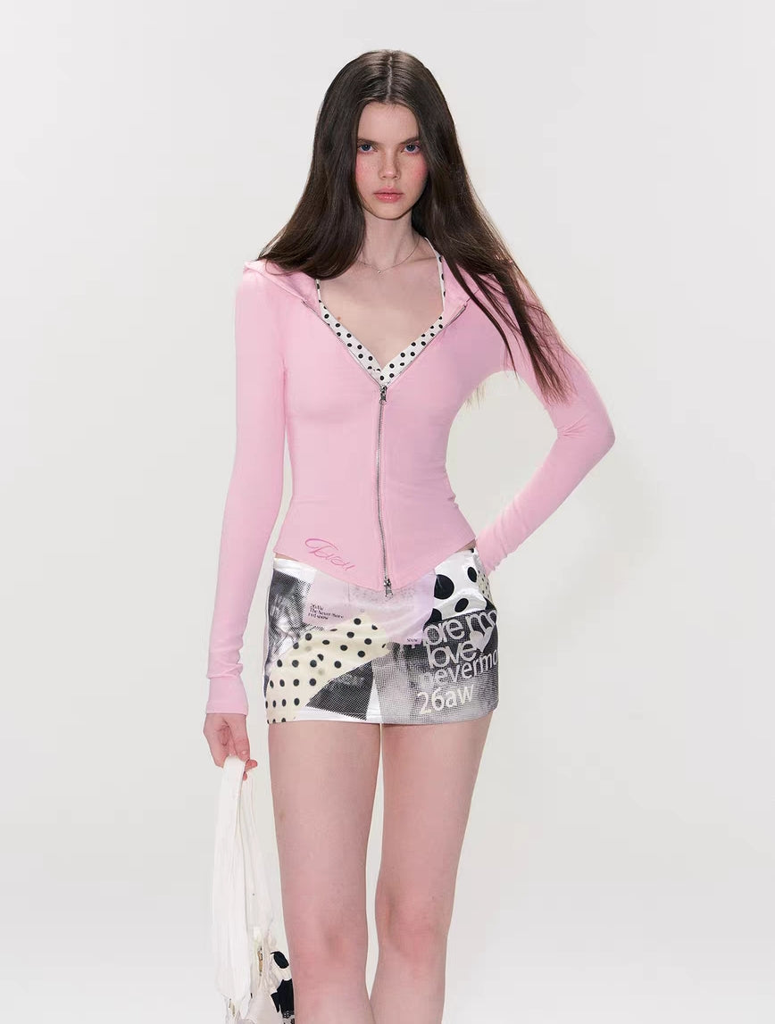 Model wearing polka collage mini skirt, front view