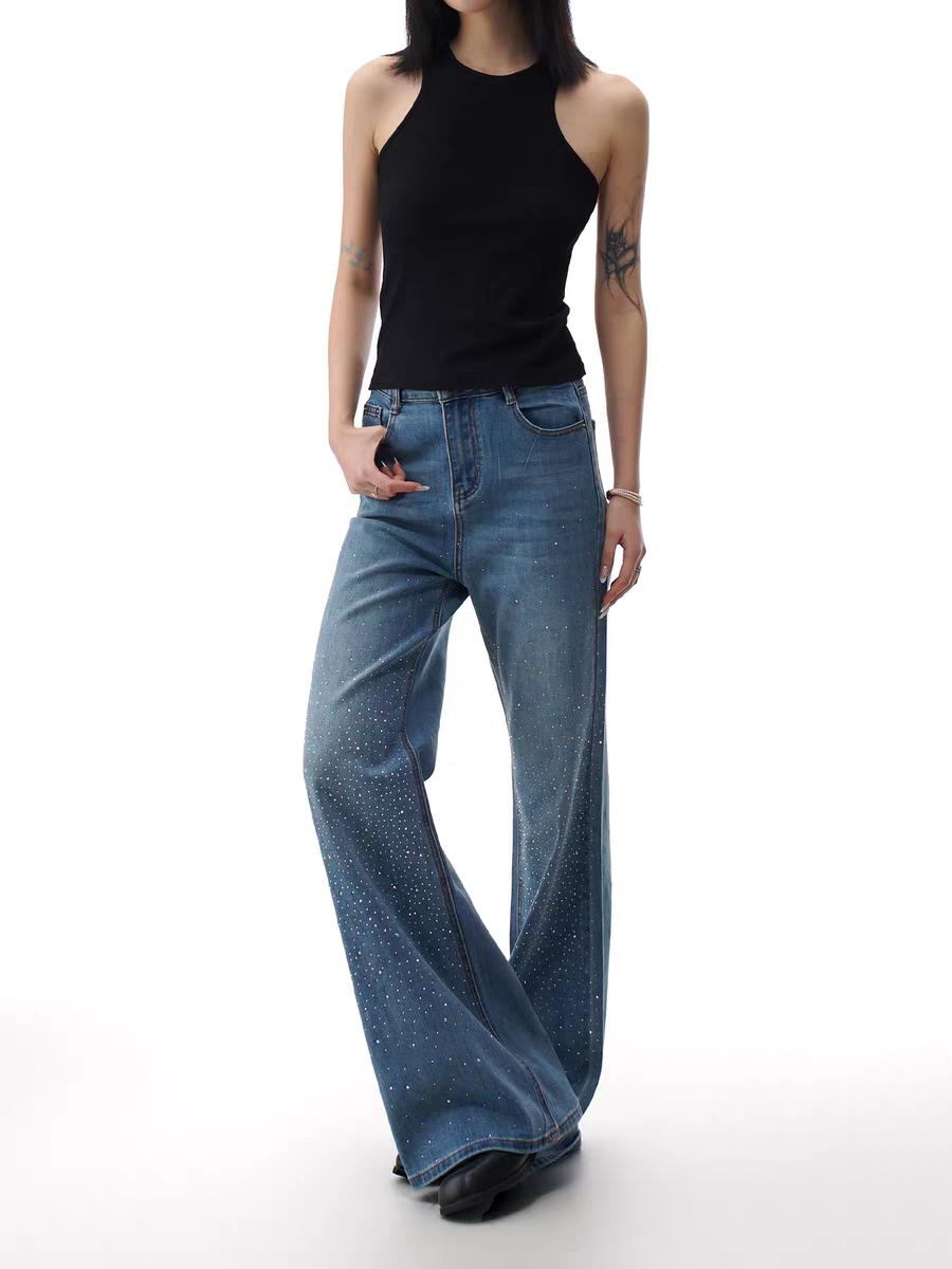 Full-length front view of rhinestone flare jeans with styling