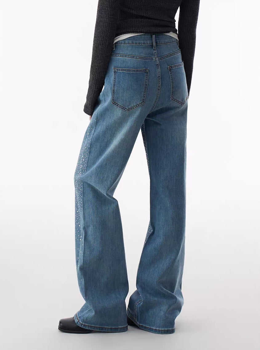 Back 3/4 view highlighting flare leg shape and rhinestone shimmer placement