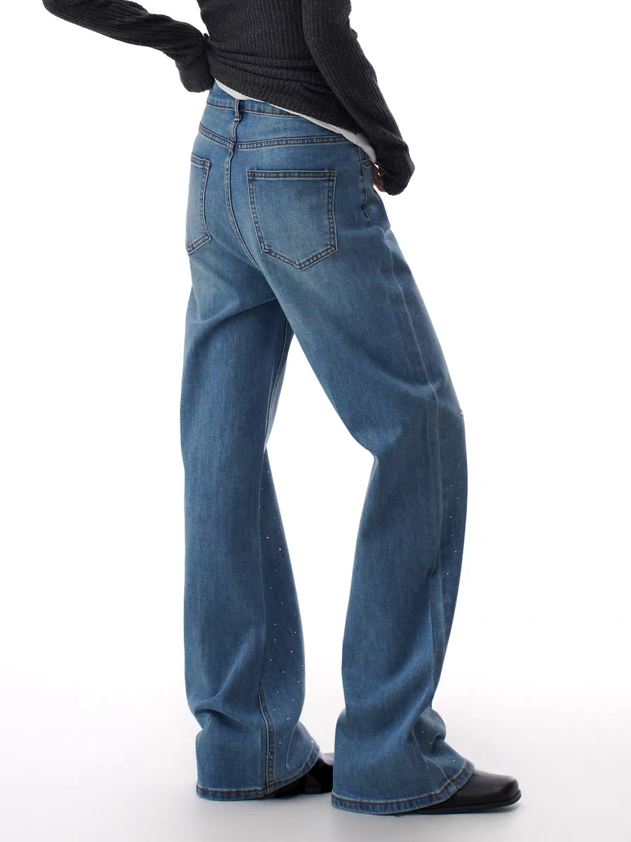 Blue star embellished denim, back angled view