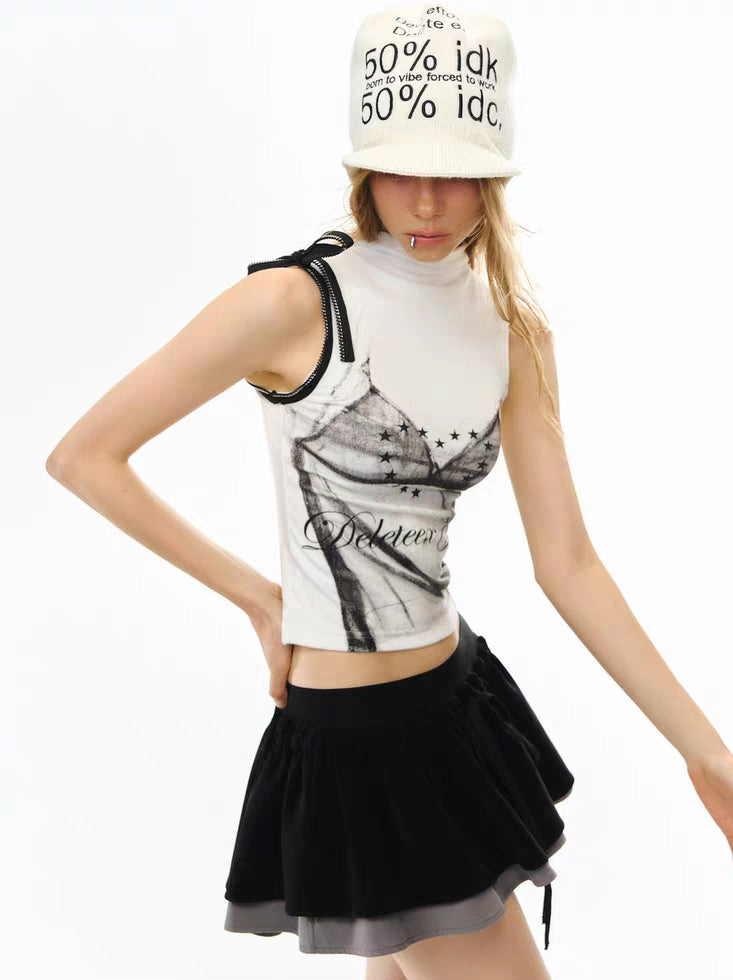 Side view of mockneck sleeveless trompe l’oeil top showing fitted silhouette