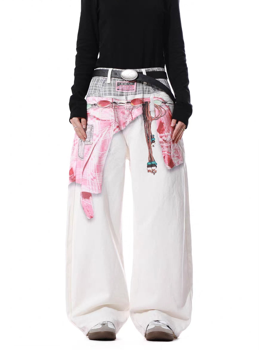 Front view of white wide-leg pants with trompe l’oeil plaid waist and pink shirt-tie graphic