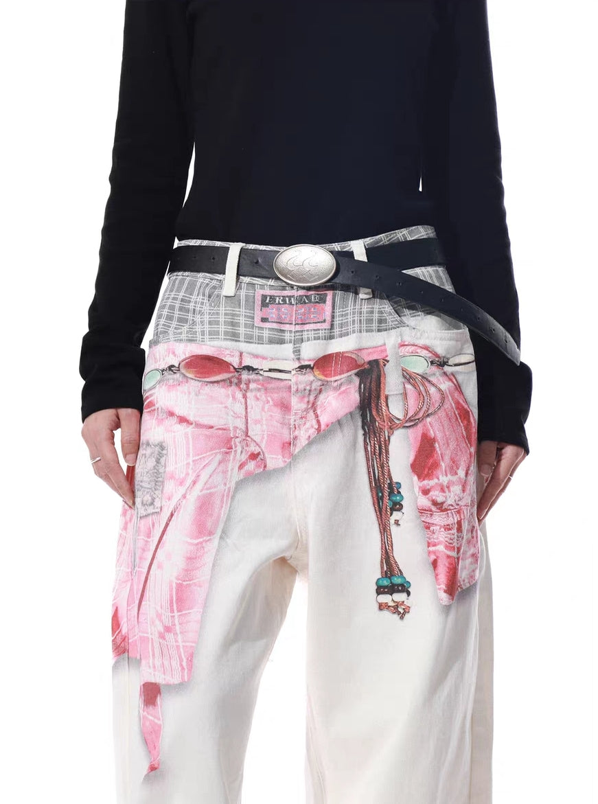 Close-up of trompe l’oeil waistband with plaid panel and shirt-tie graphic detail