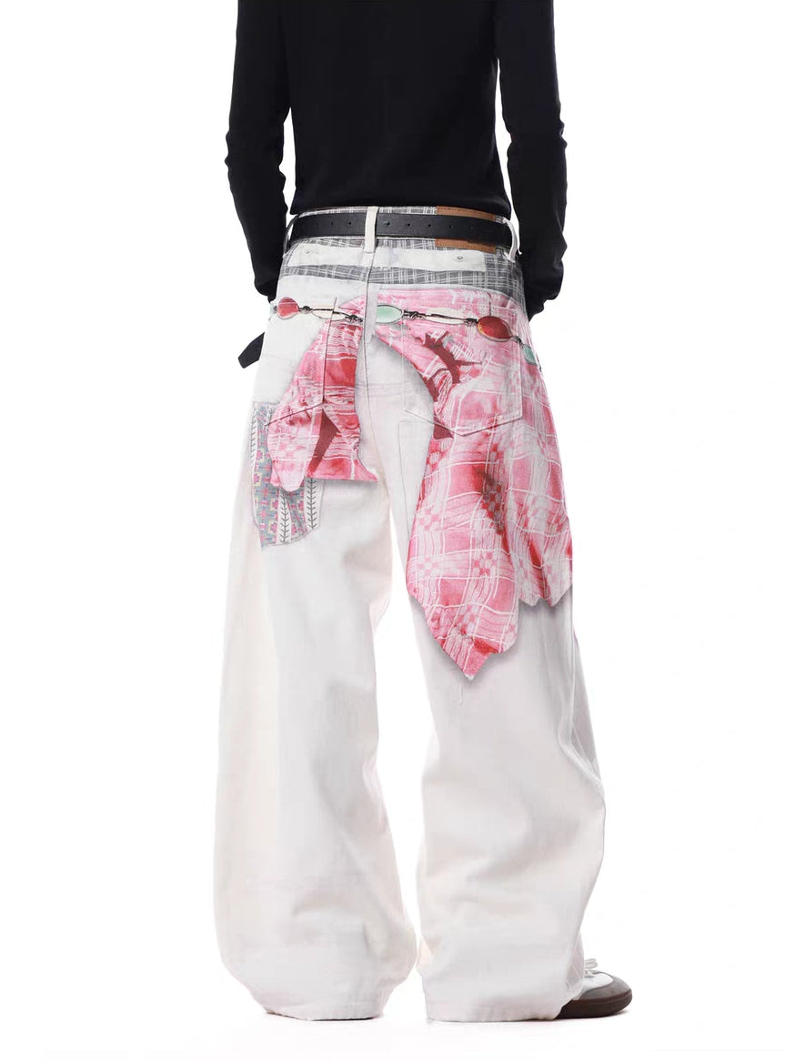 Back view of white wide-leg pants showing pink shirt-tie graphic from behind