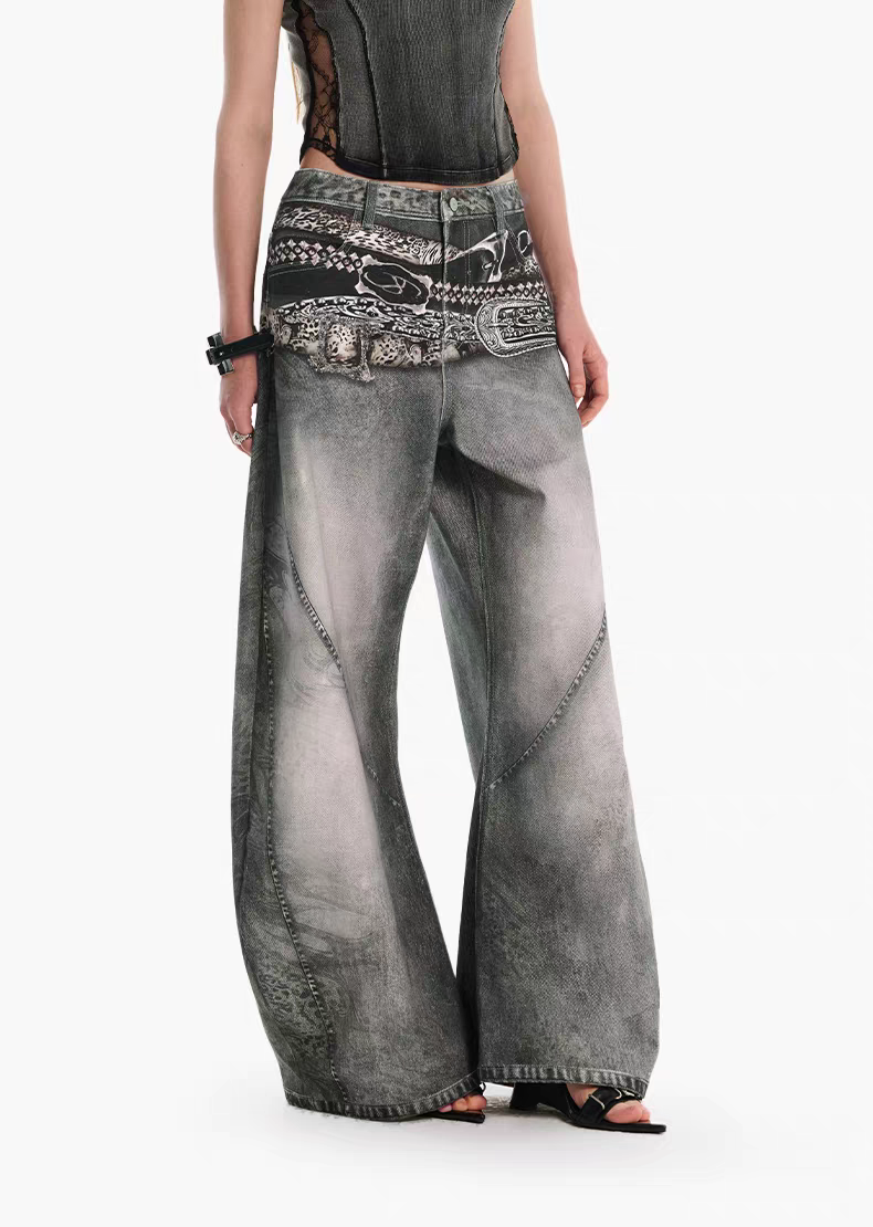 Model_wearing_grey_washed_wide-leg_jeans_with_bandana_print_waistband_front_close-up