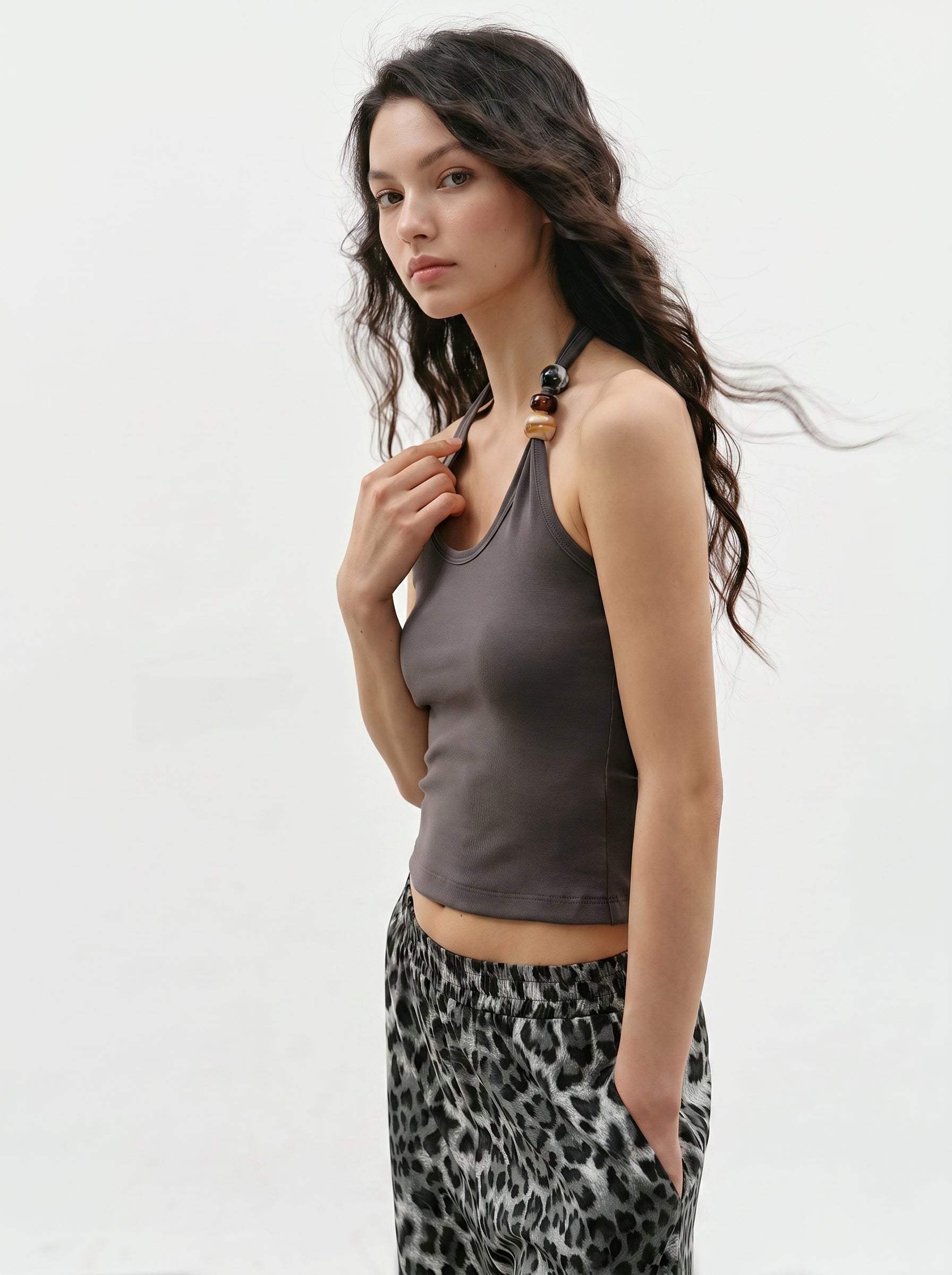 Charcoal beaded halter tank side view with decorative shoulder beads