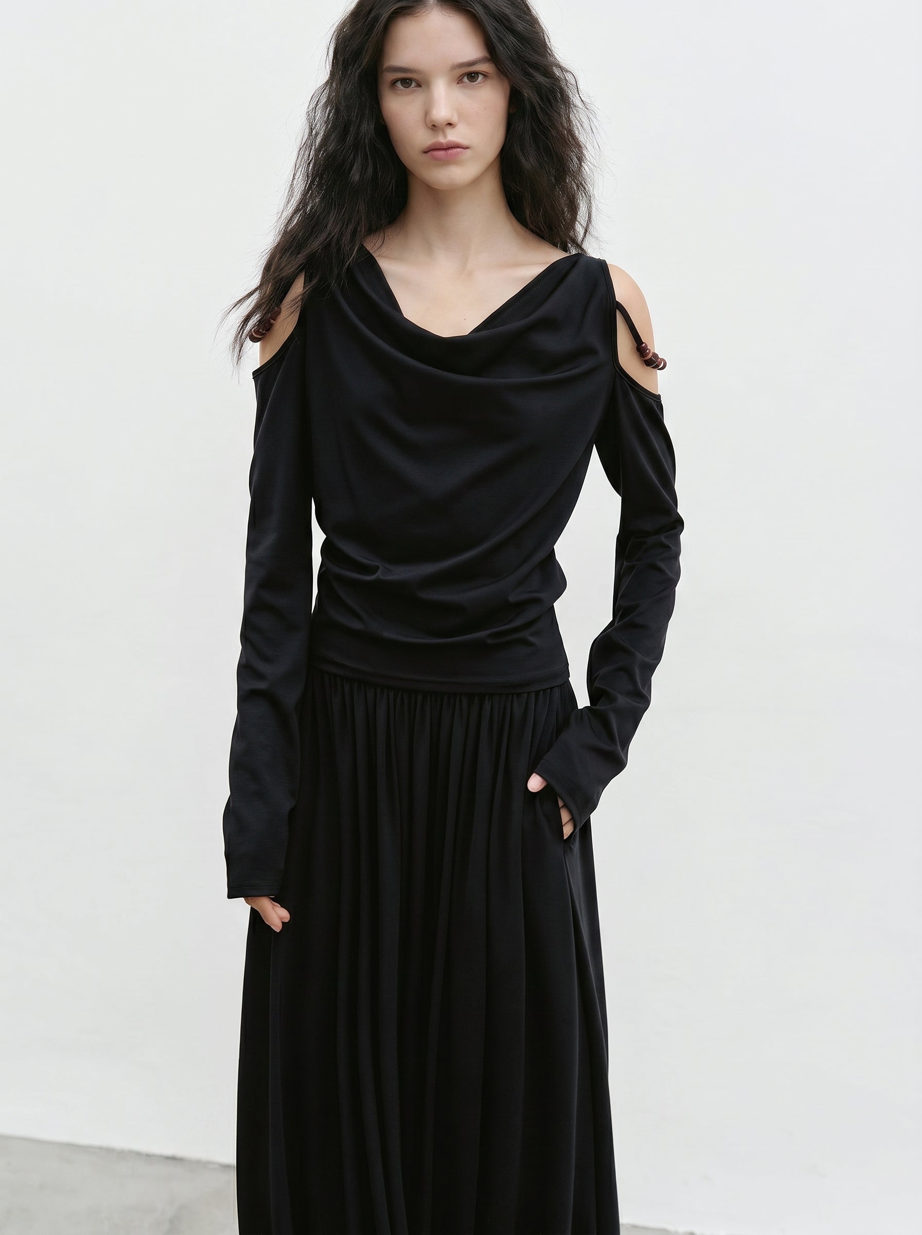 Black off shoulder top and maxi skirt set front view
