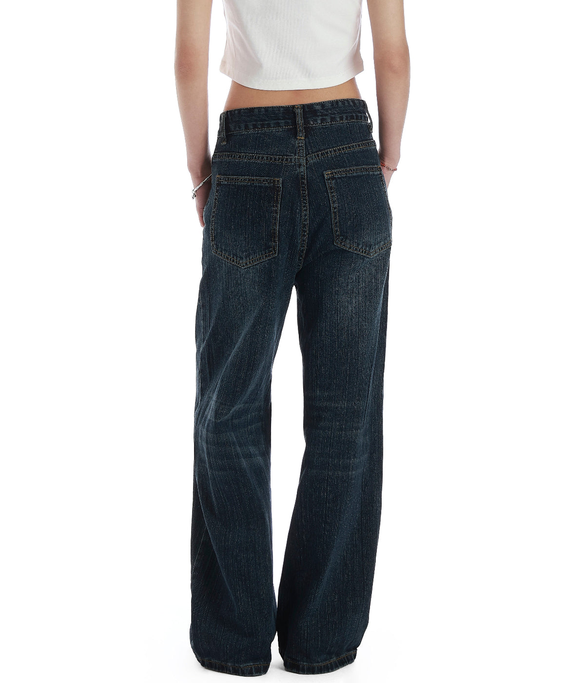 Back view of black rhinestone wide leg jeans showing rear pockets and relaxed wide leg fit
