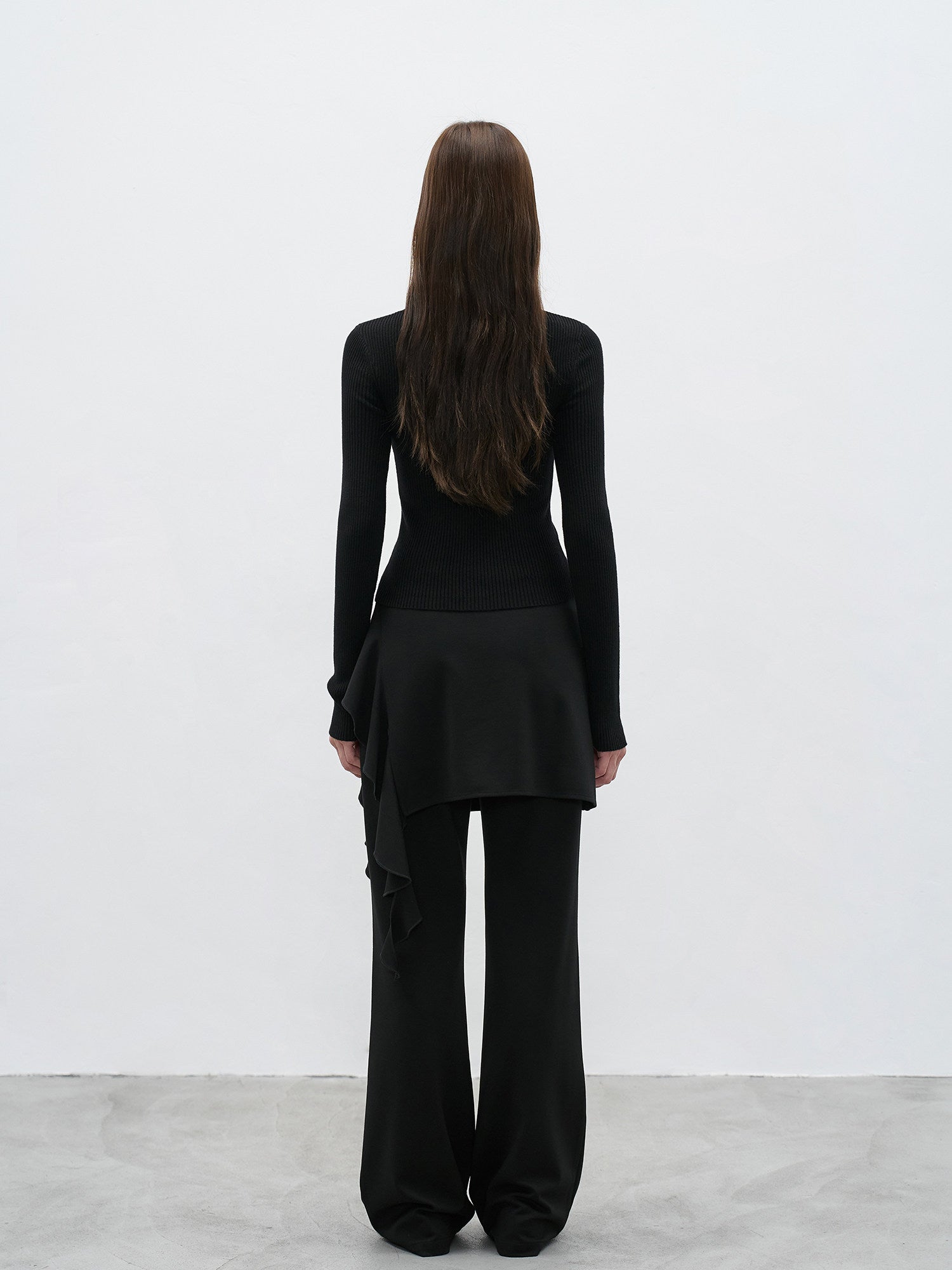 Black ruffle layered high waist flared pants back view