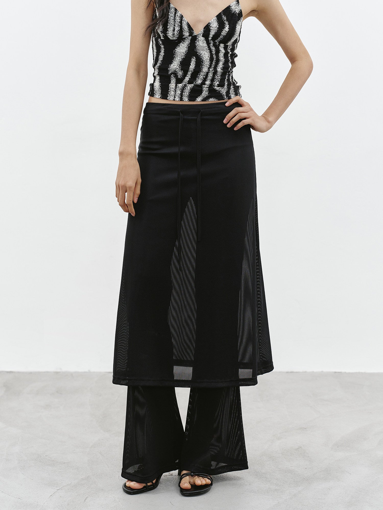 Black sheer layered maxi skirt front view with layered design