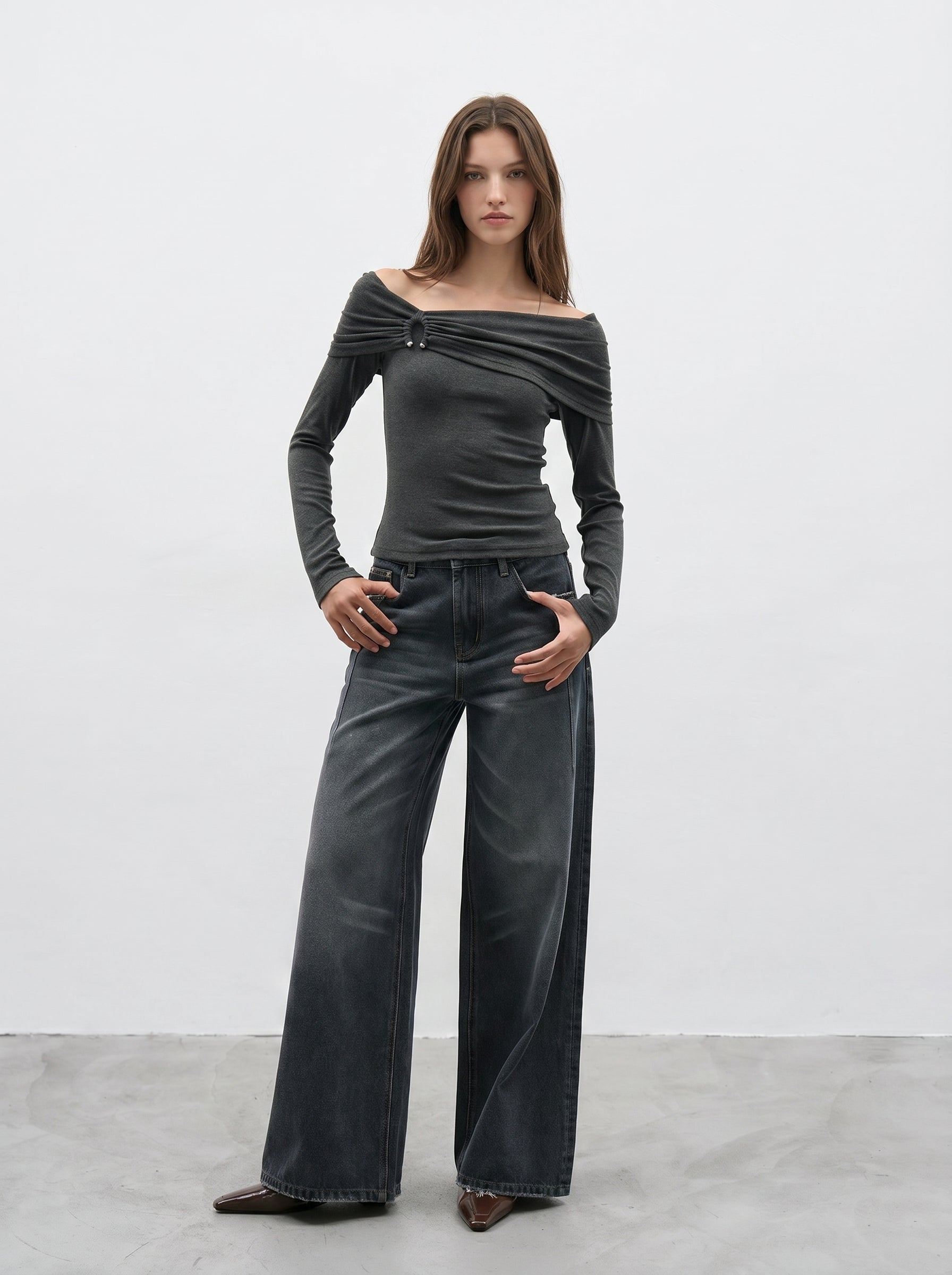 Dark wash wide leg jeans styled with off shoulder long sleeve top