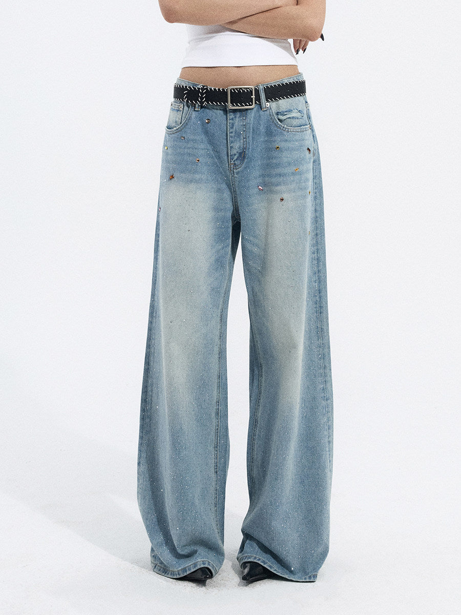 Front view of light blue wide-leg jeans with a relaxed oversized fit and washed denim texture